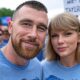 Travis Kelce and Taylor Swift at a Parade