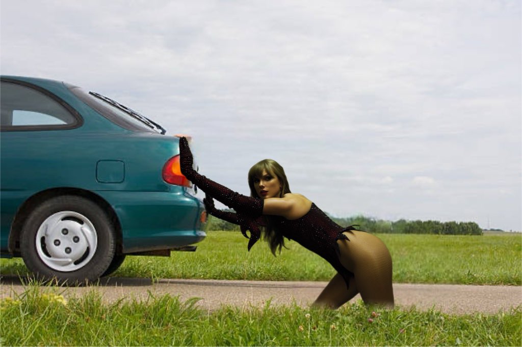 Taylor Swift Pushes car