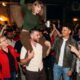 Travis Kelce Steals the Spotlight With Hilarious Dance Moves While Carrying Wife Taylor Swift Across the Dance Floor at Mom Donna Kelce’s 74th Birthday Celebration, With Jason Kelce and Patrick Mahomes Also in Attendance